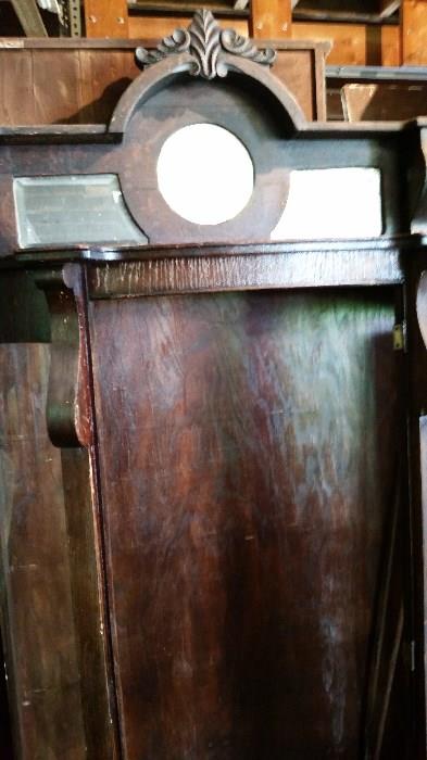 Antique curved cabinet with mirror décor at top...needs tlc, but a beautiful piece with some restoration.