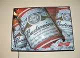 Light-up Budweiser sign.