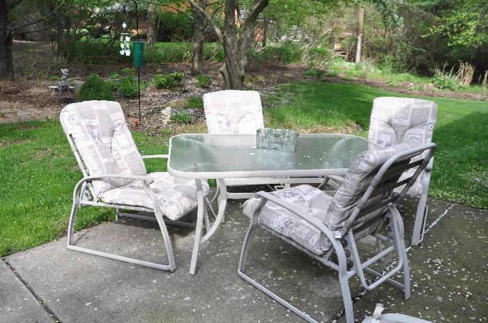 Outdoor Rectangle dining table with 4 chairs and cushions