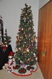 7 foot lighted and fully decorated Christmas tree