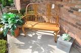 Vintage wooden bench, Borden's milk box and one of many silk plants available