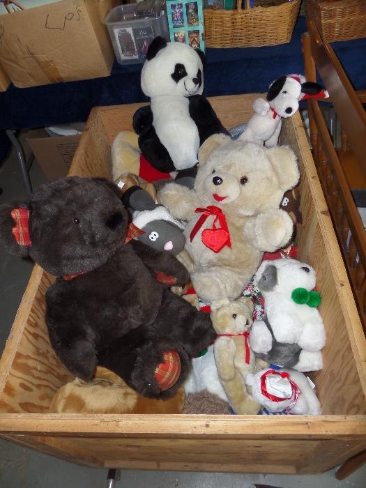 large wood crate full of stuffed animals 