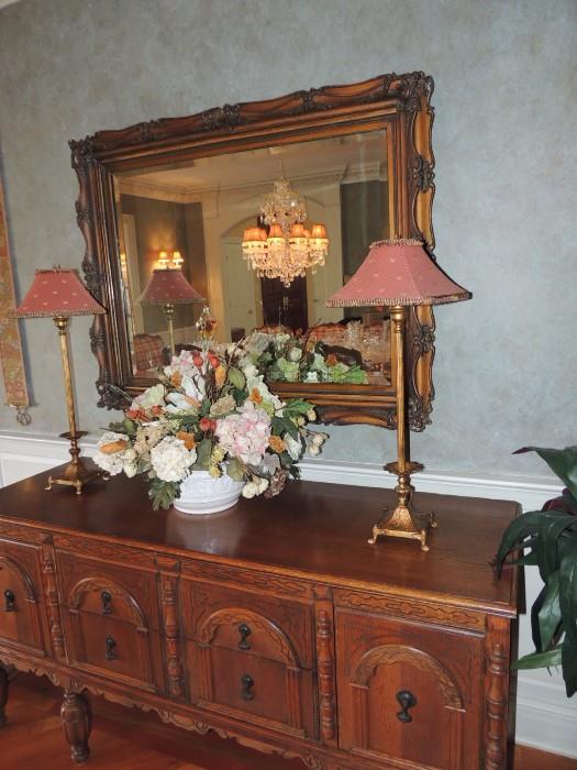 antique oak side board, high end beveled mirror, pair of designer lamps