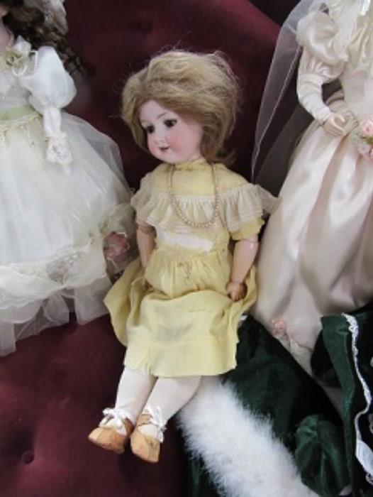One of the early dolls. More that I haven't examined yet. Armand Marsailles doll with composition jointed body in good condition.  original clothes. 
