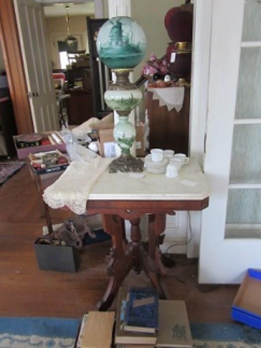 East lake marble top table.  There are 3 others similar to this one.   The banquet lamp is in excellent condition.
