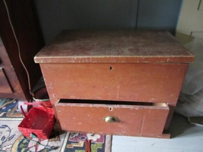 A note inside this blanket chest with lower drawer states the piece was made in 1850 by a family member. 