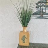 decorative ceramic jug with seagrass