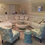 Leather sectional, slipper chairs, celadon garden seat table, round coffee table wood scroll
