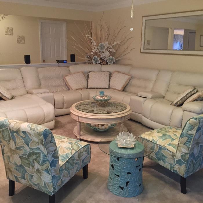 Leather sectional, slipper chairs, celadon garden seat table, round coffee table wood scroll