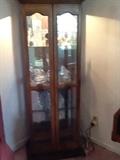 Curio cabinet with side entry doors