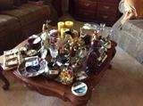 Coffee table full of items - all priced to sell