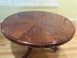 Fine Crotch Mahogany Carved Base Dining Table