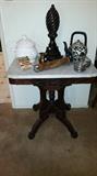 Eastlake marbled parlor side table.