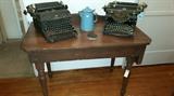 Antique typewriters. Antique library/side table.