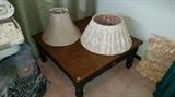 Country pine cocktail/coffee table with drawer. Nice lampshades.
