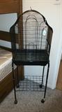 Nice birdcage on rolling stand.