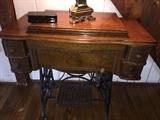 From the 1800s, Working Chautauqua Sewing Machine with original Leather Belt. Very Rare and a Beautiful Piece of furniture as well.