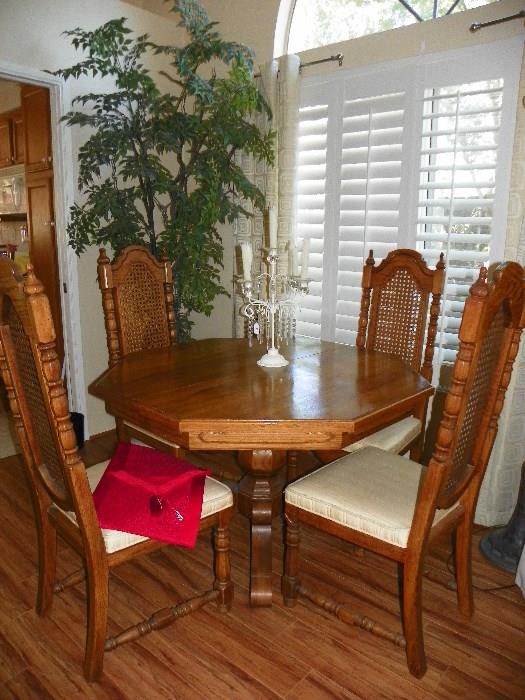 Dining Set has Six Chairs and Two Leaves.