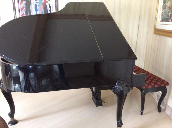Kimball Baby Grand High Gloss with matching bench. Note the grace of the legs and the high gloss it s stunning. 