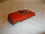 VINTAGE Metal Red & White Sedan with male & female onside...great piece!!!!!