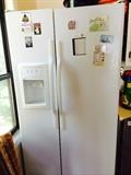 Almost brand new - Hot point side by side fridge model # HSS25GFPE WW