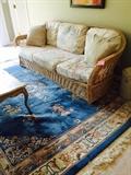 Rattan sofa / gorgeous Blue wool rug