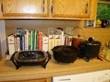 small appliances, footed cast iron pot