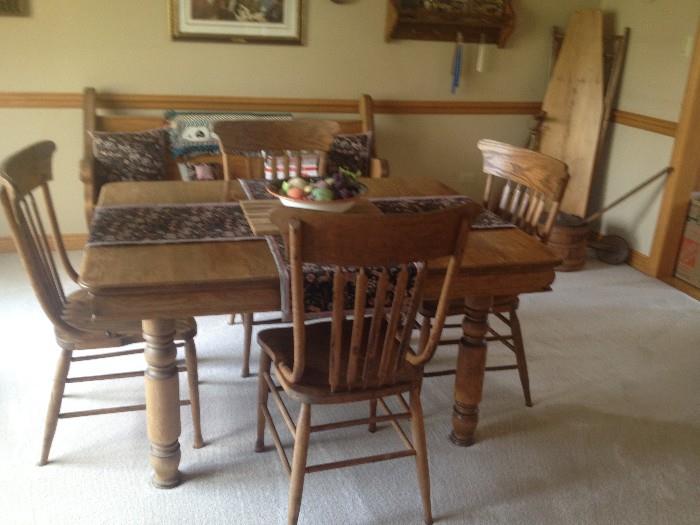 Antique table with one leaf and 4 chairs.