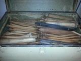 Trunk full of Spindles and Bobbins from a cotton mill