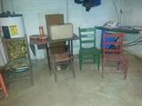 Old sewing machine, various vintage chairs and ironing board
