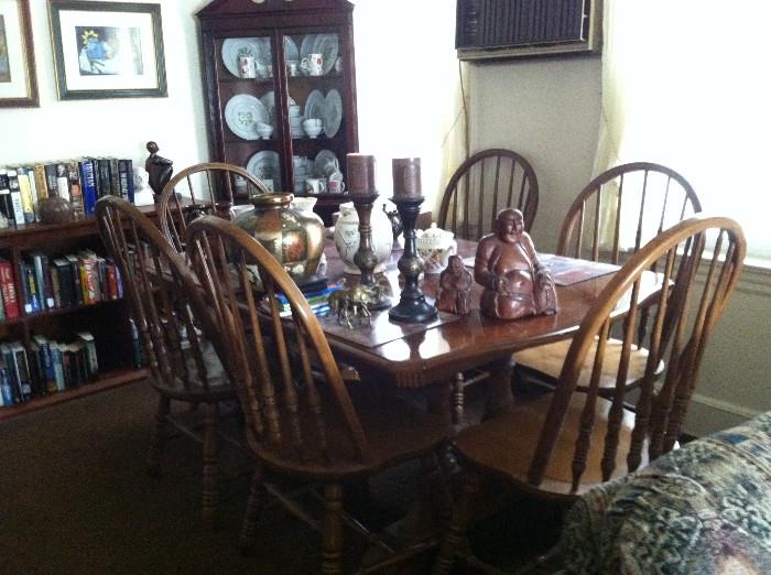 Dining table for six. There is another leaf for this table. Note the bookshelf and corner china cabinet in the background.