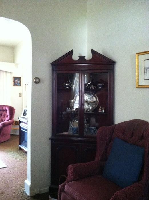 You have to see the texture of this armchair. Note the corner china cabinet.