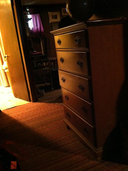 Five-drawer dresser.