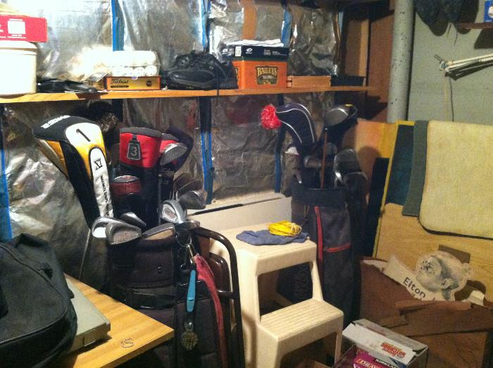 Two sets of golf clubs.
