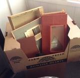 unassembled old doll house