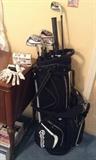 Taylor Made golf clubs and bag