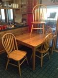 nice oak table and 4 chairs
