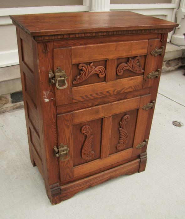 C/1880's Oak 2 door Icebox w/applied carvings, brass hardware and original finish
