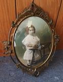 C/1900 hand tinted photo of little girl in convex glass frame 