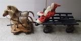 C/1910 German fur covered horse team on iron wheels signed Robert Bauer w/C/1900 handmade wagon and a lg. C/1900 composition Belsnickel Santa Figure
