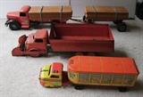 C/1950's Heavy Metal Tandem Lumber Carrier ~ C/1950's Wyandotte Red Dump Truck w/front end scoop ~ C/1950's Marx tin litho Marcrest Livestock tractor trailer ~ 