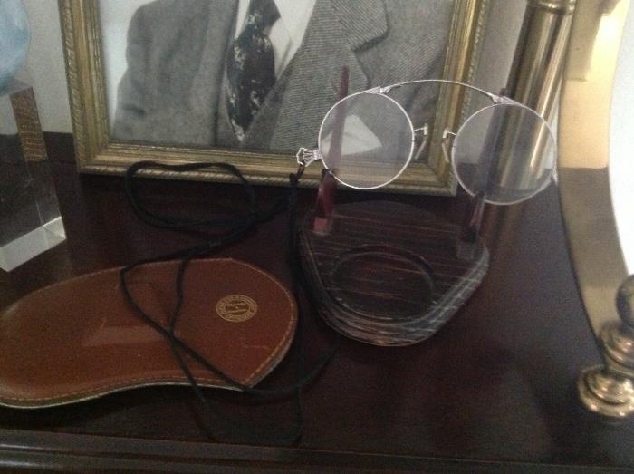 Antique specks with stand and leather case