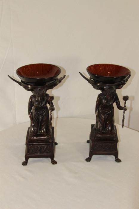 Furnishing – Pair of bowls on decorative pedestals. Kneeling angel holding a flower is propping up a bowl on back. Intricately made base and pedestal. Bowls are marked ‘Joseph Abboud Ventana Rust 1152′. Unique pair
