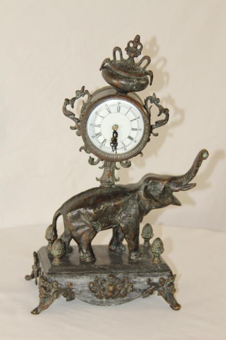 Furnishing – Table top clock with elephant base. Piece is decorative unique piece. Unmarked. Slight tarnishing to metal.