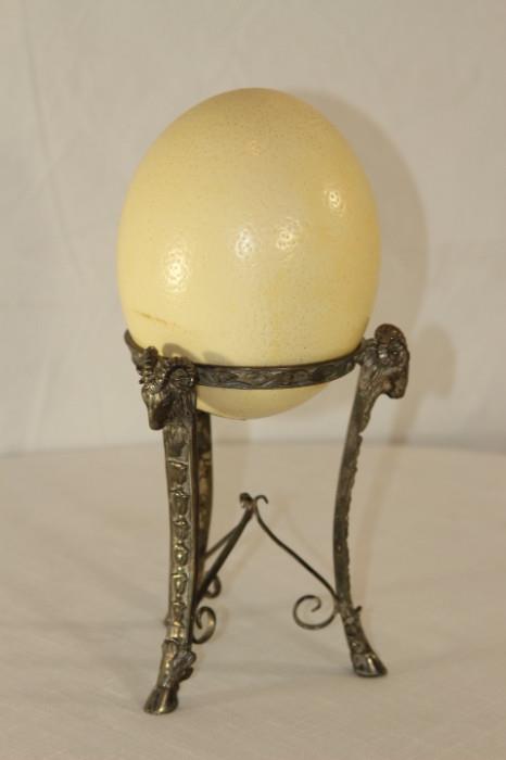 Furnishing – Decorative egg on stand. Egg is marked ‘Maitland-Smith Hand made in Philippines’. Decorative stand has three legs. 