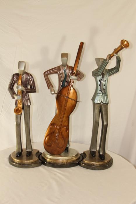 Furnishing – Three piece statue orchestra. Each piece is playing a different musical instrument. Pieces are detachable or can be displayed as one piece. Made of various metals. Nice set.