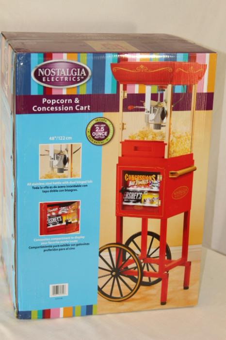 Electronics – Popcorn & concession cart. Piece is made by Nostalgia Electrics. In original box. Never been used. Mint! Piece makes 10 cups of popcorn. 