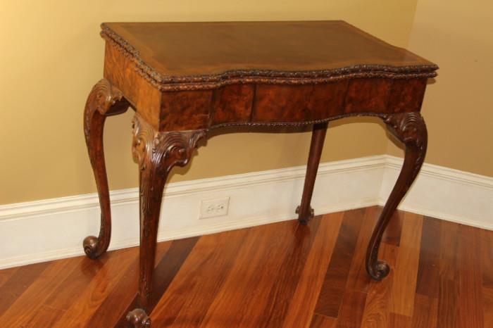 Furnishing – Side table which opens up to be a card table. Wooden table is a lovely piece. Well made, pretty piece. Decorative legs and table trim. Very nice condition. Unique piece