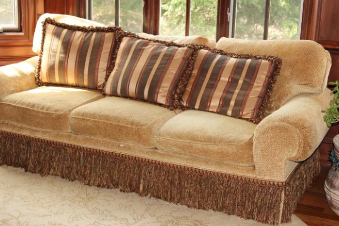 Furniture – Couch. Piece is plush with beige fabric. Comes with three throw pillows. Piece has fringed bottom. Couch marked ‘Harden’. Comfortable couch, in great condition.
