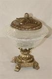 Furnishing – Decorative glass bowl on a metal stand. Piece is lovely. Glass bowl has cracked glass pattern. Bowl has metal base and matching lid. 